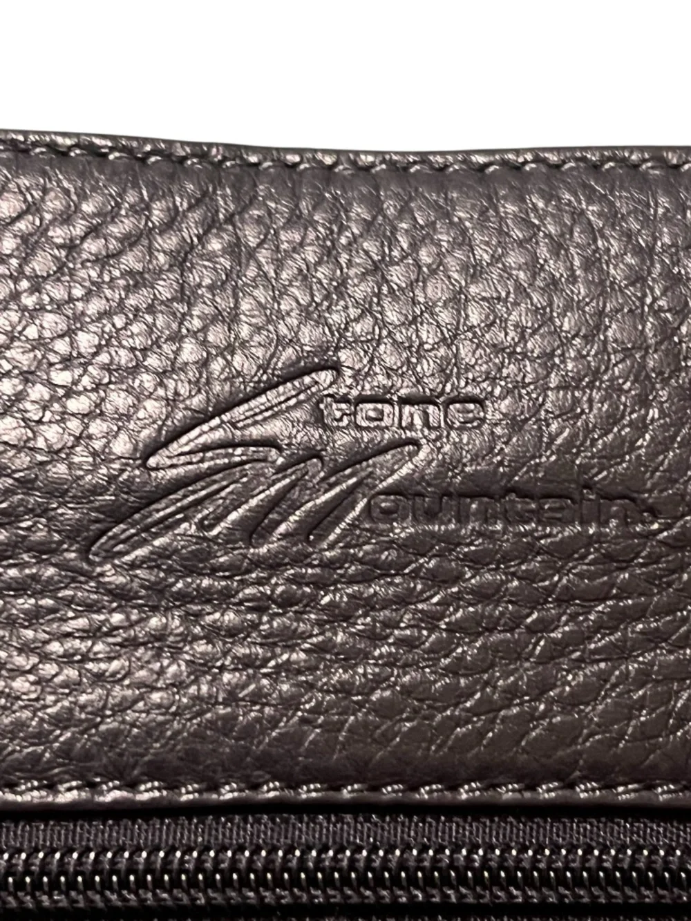Stone Mountain women's black pebbled leather crossbody bag W/ front flap pocket